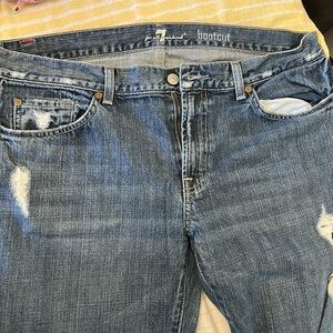 Men’s distressed boot cut jeans